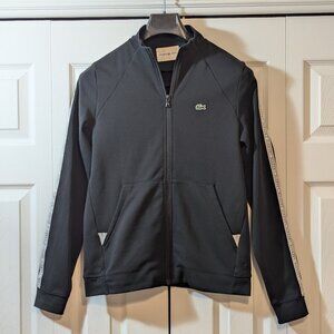 Lacoste Women's Zip-Up Black Sweatshirt with White Bands on Sleeves - Size 38
